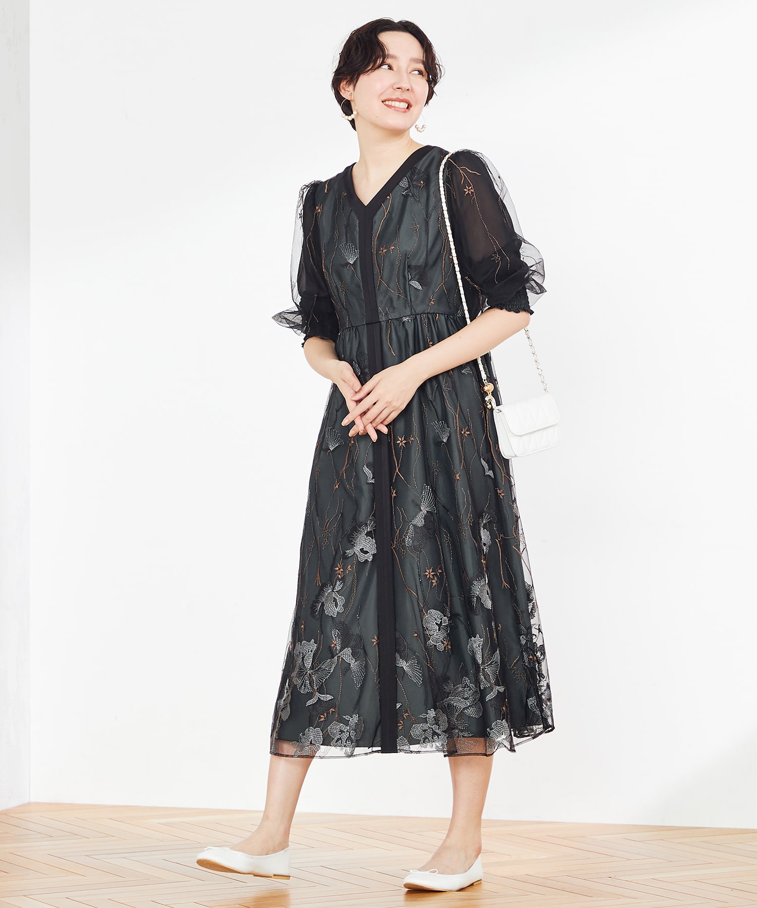 結婚式・二次会向けのCallarus(カラルス)のダークグリーンのレンタルパーティドレスの画像